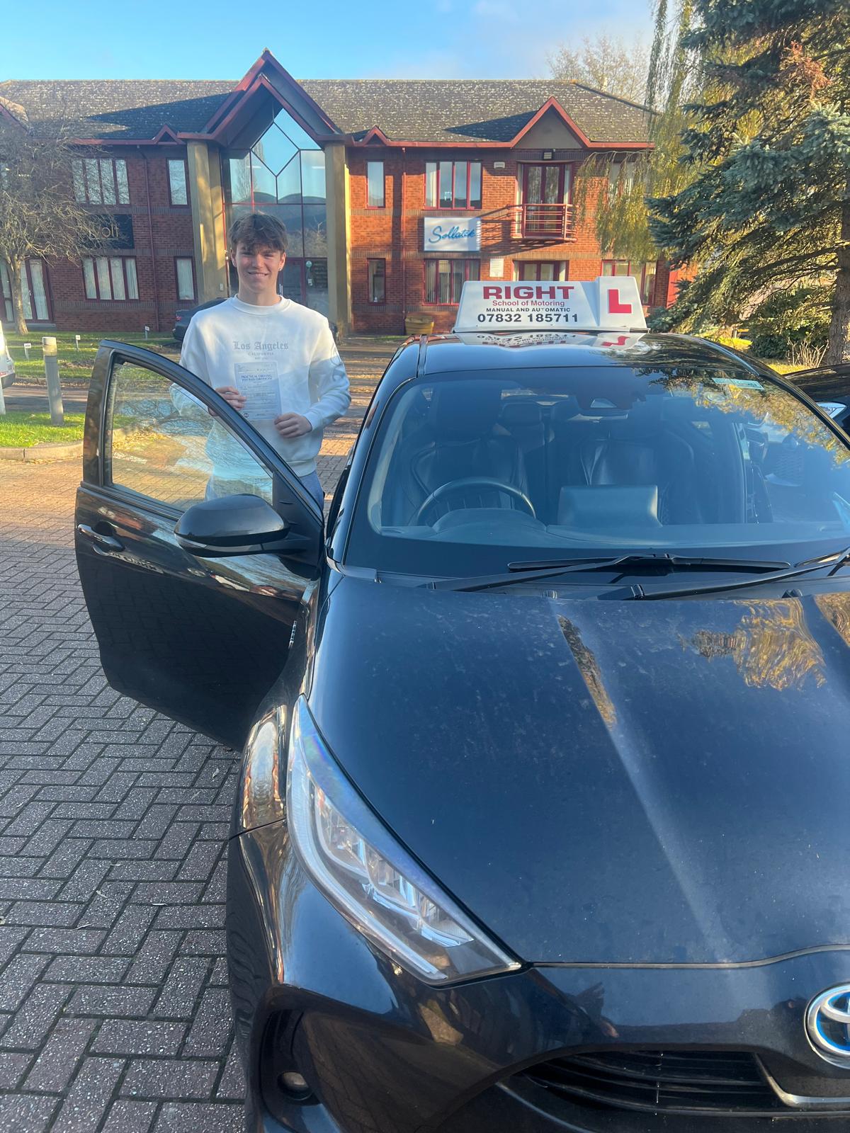 Happy student with pass certificate