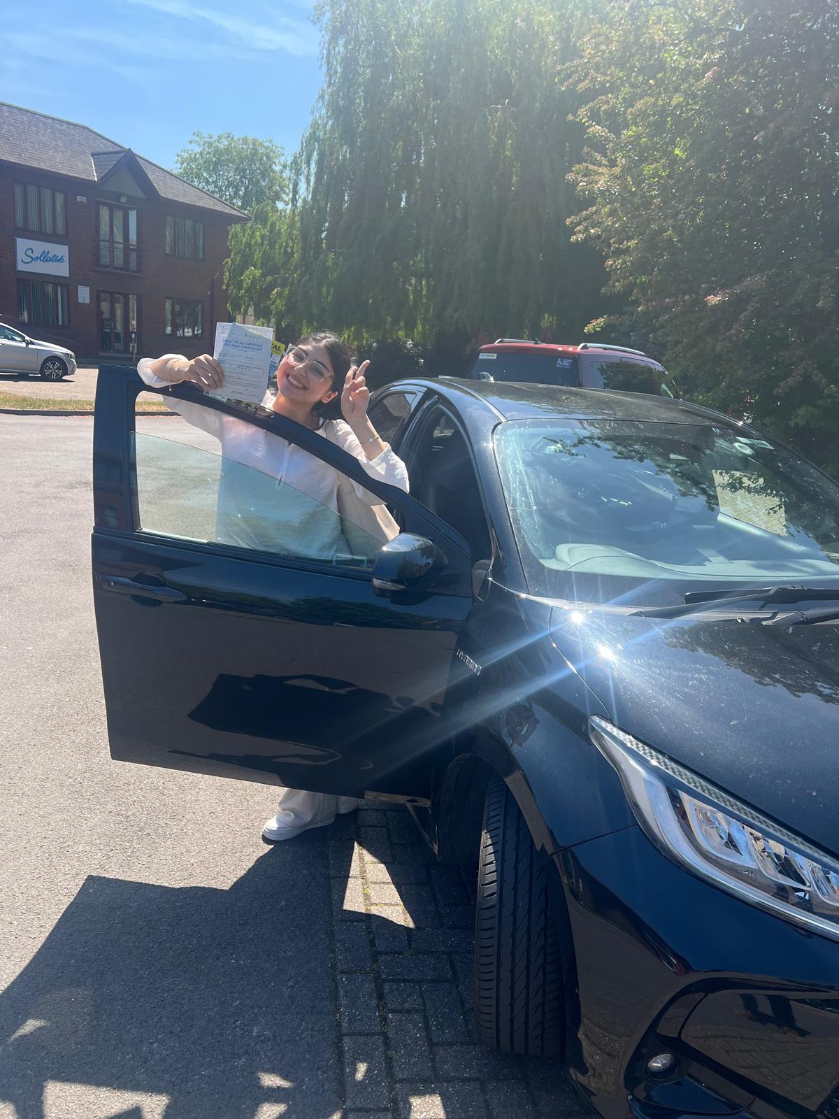 Celebrating student holding certificate